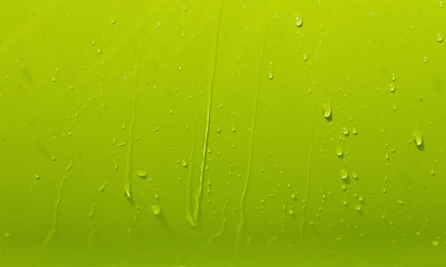 Kuhinjski paneli  Drops of water on a green - Stekleni / PVC plošče / Pleksi steklo - s tiskom za kuhinjo, Stenske obloge PKU0392 - Life-decor.si